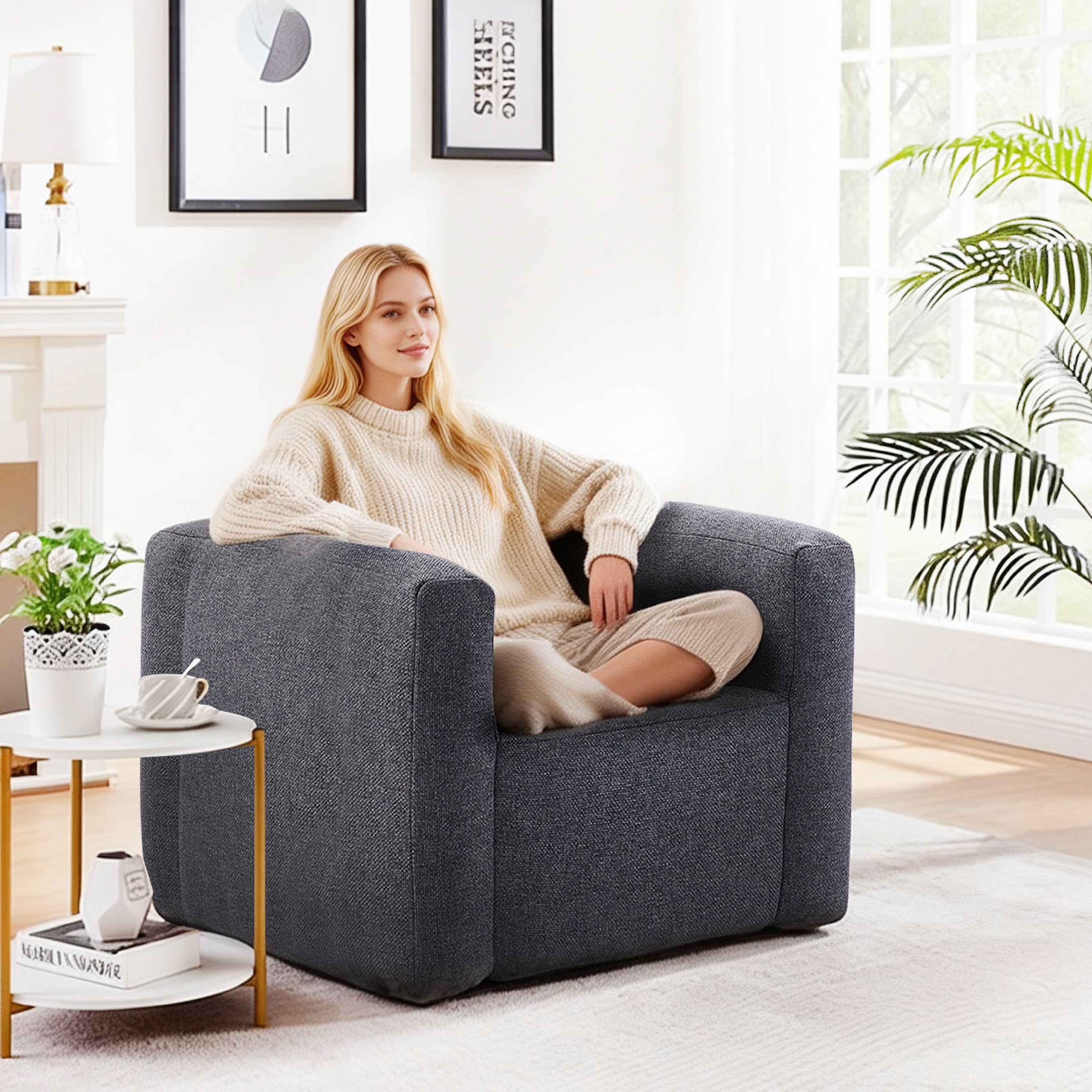 Portable linen inflatable sofa chair in grey, front view with textured linen-blend cover